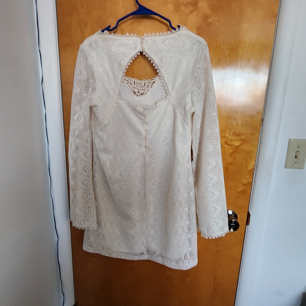 Off white long sleeve short dress.